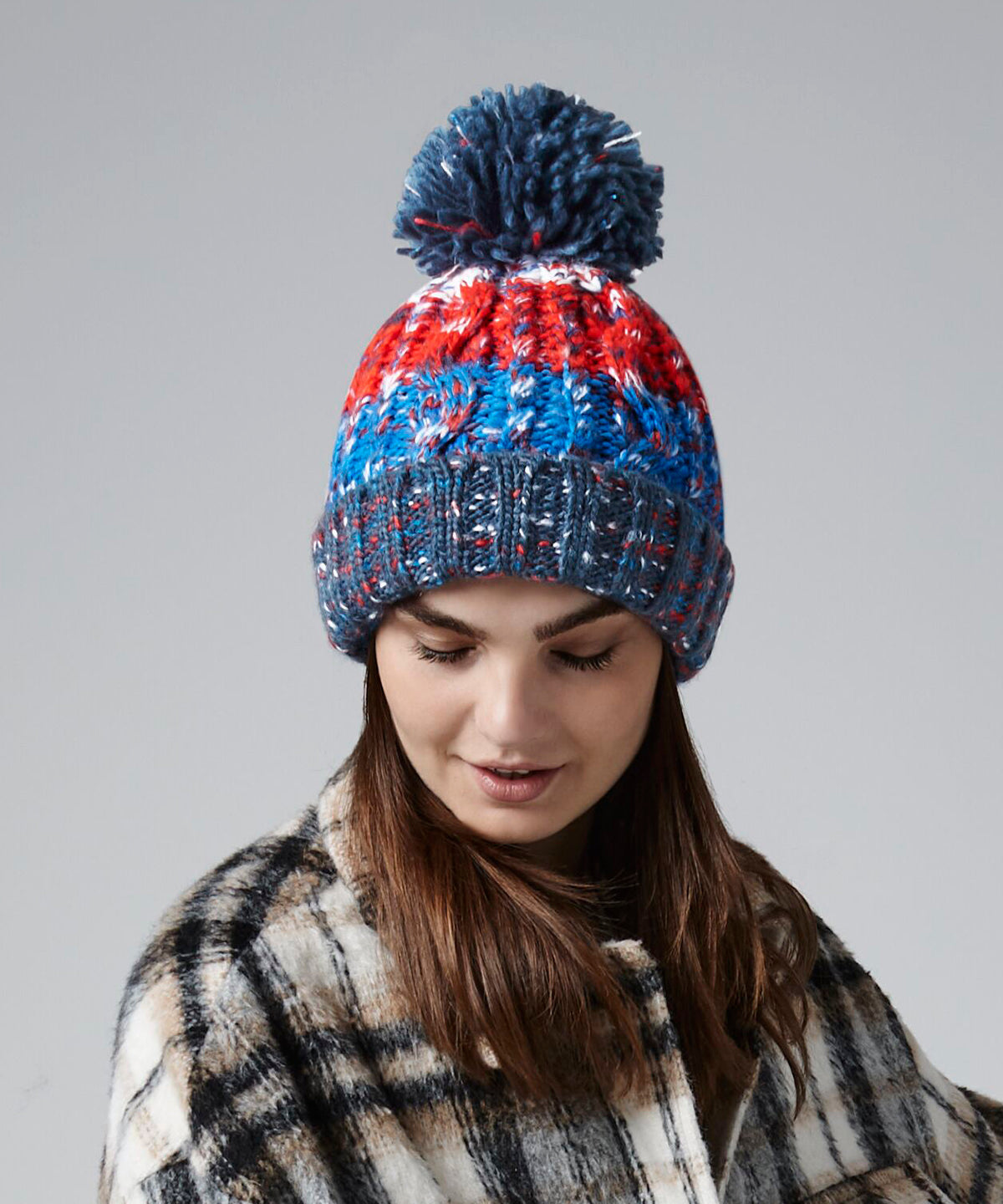Corkscrew pom pom beanie