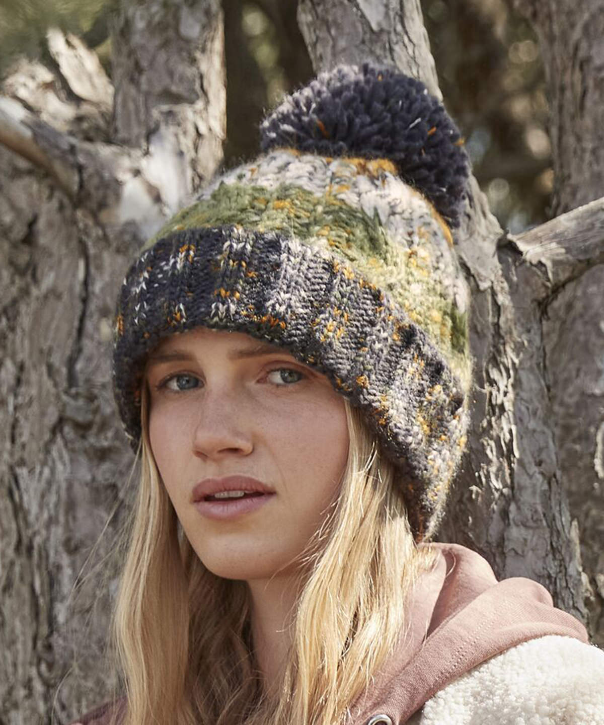 Corkscrew pom pom beanie