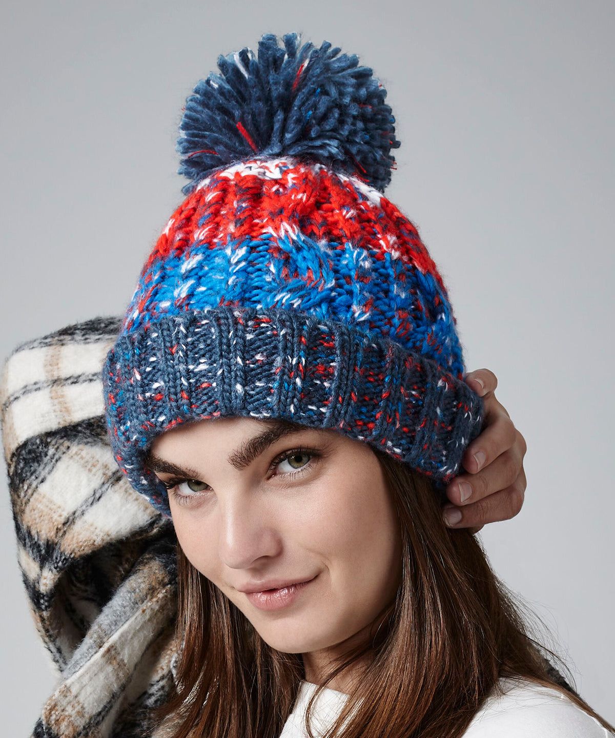 Corkscrew pom pom beanie